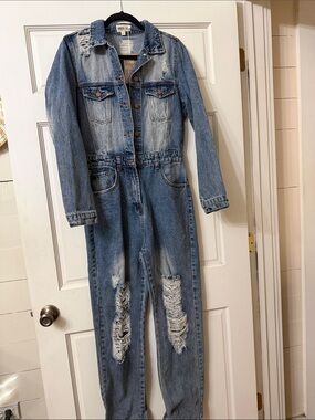 Distressed Light Blue Denim Jumpsuit by Mudd
